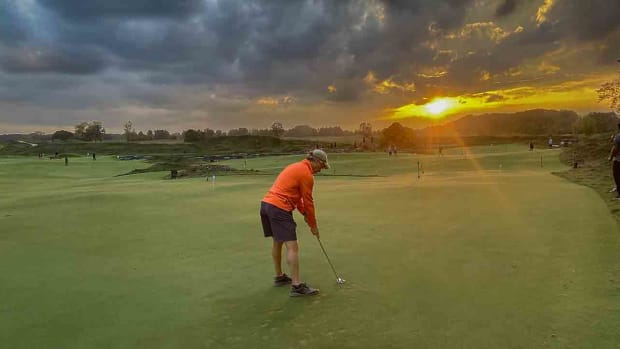 Jay Stocki is pictured while attempting to hole a world-record putt at The Baths in Kohler, Wis.